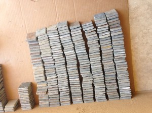 Sorting tiles by thickness.